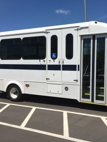 Mecklenburg Transportation System bus parked n a parking lot